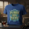0% Irish 100% Sexy text design in gold and teal on a blue t-shirt, with ornate scrollwork