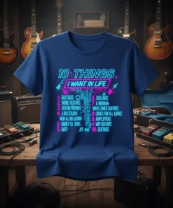 Blue t-shirt with neon pink and cyan text listing "10 Things I Want In Life" including guitars, guitar friends, and