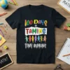 100 Days of Taming Tiny Humans text with colorful letters and children graphic on a black t-shirt