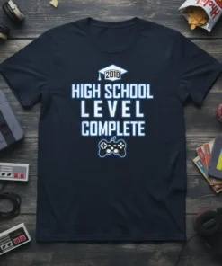 Navy blue t-shirt with "2018 HIGH SCHOOL LEVEL COMPLETE" in white block letters and a graduation cap graphic above, plus