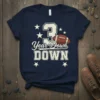 Navy blue t-shirt with "3 Year Down" text, number 3, and a football graphic with stars
