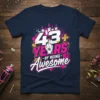 Navy t-shirt with "43+ Years Of Being Awesome" text, middle finger graphic, and birthday candles