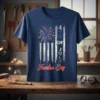4th of July Freedom Day T-Shirt featuring distressed American flag design with fireworks and bold text