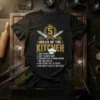 Black t-shirt with "5 Rules of the Kitchen" quote, featuring crossed knives and chef's hat graphic, listing cooking rules