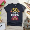 50 Days of School t-shirt design with gold glitter text, books, hearts, and a rainbow graphic
