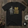 T-shirt with "50 Officially A Grumpy Old Man!" text and illustration of a vintage man in a top hat holding