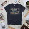 Navy t-shirt with bold text: "6 OUT OF 7 % 6/2 TEACHERS 6% TEACHERS THINK 67% OF STUDENTS OVERUSE 67"