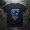 Black t-shirt featuring the number 67 in a neon, circuit-board style design with futuristic city elements, primary keyword 67