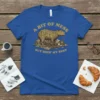A blue t-shirt with the quote "A Bit of Mess But Doin' My Best" and an illustration of a capybara