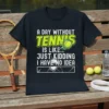 A day without tennis is like just kidding I have no idea quote on a black t-shirt with tennis ball