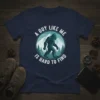 Navy blue t-shirt featuring "A Guy Like Me Is Hard To Find" text around a Bigfoot graphic in a forest