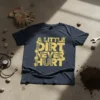 A Little Dirt Never Hurt graphic tee with tire track design and yellow distressed font