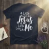 Navy blue t-shirt with white text that reads "A Little More Like Jesus A Little Less Like Me" in a