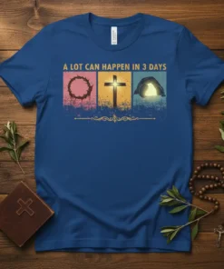 Christian T-Shirt with text "A Lot Can Happen In 3 Days" and graphics of crown of thorns, cross, and empty