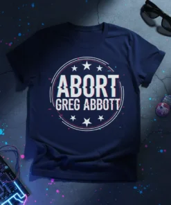 Navy blue t-shirt with "ABORT GREG ABBOTT" text in a distressed, glitchy font within a circular graphic with stars