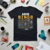 ADHD BINGO t-shirt design with a bingo card filled with common ADHD symptoms and behaviors, printed on a black tee