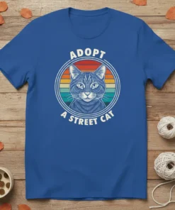 Adopt A Street Cat graphic t-shirt featuring a vintage-style cat portrait with retro sunset stripes