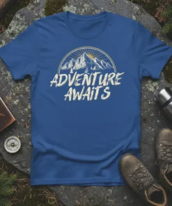 Blue t-shirt with "Adventure Awaits" text and mountain graphic, featuring a sun and landscape