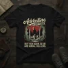 Black t-shirt featuring the quote "Adventure IS OUT THERE BUT THEN AGAIN, SO AR ARE SERIAL KILLLERS." with a Bigfoot