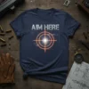 Aim Here T-Shirt with a gun target graphic and blueprint background, designed for shooting enthusiasts