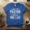 Ain't No PASTOR LIKE the ONE I GOT quote on a blue t-shirt, featuring a bible graphic and cross symbols