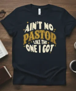 Ain't No Pastor Like The One I Got quote on a dark navy t-shirt, featuring retro-style typography in yellow and