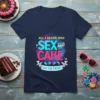 T-shirt with "All I Heard Was Sex And Cake So I'm Here" text, featuring colorful galaxy background and baby footprints