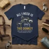 Navy t-shirt with geometric donkey graphic and quote "ALL I NEED IS THIS DONKEY AND THAT OTHER DONKEY ...and those