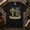 Black t-shirt with gold text "All My Role Models Went To Prison" and a cross with a crown of thorns