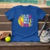 Softball t-shirt design with the quote "All The Pretty Girls Walk Like This!" featuring silhouette softball players and a large