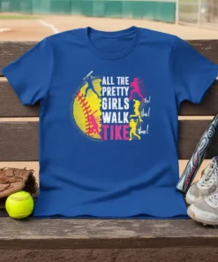 Softball t-shirt design with the quote "All The Pretty Girls Walk Like This!" featuring silhouette softball players and a large