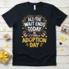 All The Wait Ends Today It's Finally Adoption Day text on a black t-shirt, featuring pink and yellow heart accents