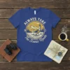 Always Take The Scenic Route t-shirt with vintage lighthouse, sailboat, mountains, and waves graphic