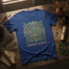Blue t-shirt with a gold and teal Mayan calendar design and the text "Ancient Echoes"