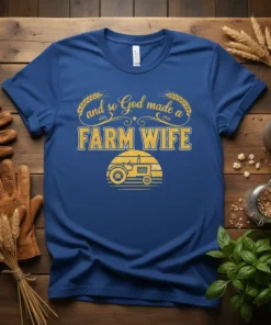 Blue t-shirt with yellow text "And So God Made a FARM WIFE" and a vintage tractor graphic