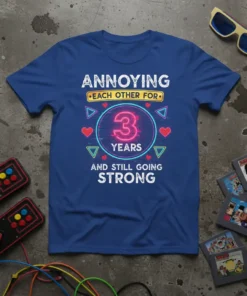 Annoying Each Other For 3 Years And Still Going Strong text design on a blue t-shirt with retro gaming graphics