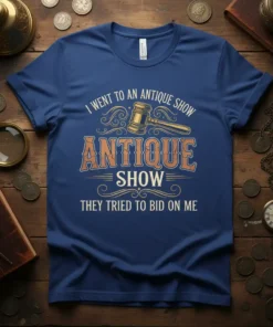 Blue t-shirt with "I went to an antique show, antique show, they tried to bid on me" text and a