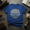 Anxiety University Honors Program text design on a blue t-shirt with vintage emblem and wings