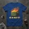 Are We Great Yet? quote with a burning dumpster graphic on a blue t-shirt