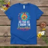 Tie dye t-shirt with text "AS FAR AS I KNOW I'M Delightful" and retro sunglasses graphic