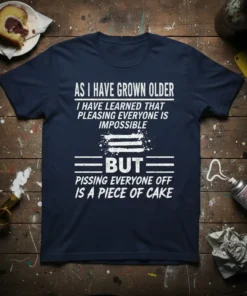 Navy t-shirt with white text that reads "AS I HAVE GROWN OLDER I HAVE LEARNED THAT PLEASING EVERYONE IS IMPOSSIBLE