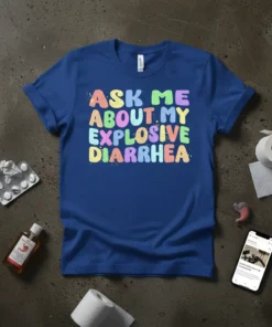 Blue t-shirt with colorful, bold text reading "ASK ME ABOUT MY EXPLOSIVE DIARRHEA" in a playful font