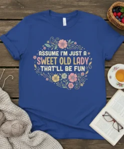 T-shirt with "Assume I'm Just A Sweet Old Lady That'll Be Fun" quote surrounded by floral design, vintage style