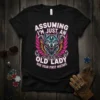 T-shirt with "Assuming I'm Just An Old Lady Was Your First Mistake" text and a fierce wolf with wings graphic