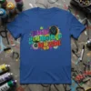Aunt Godmother Legend colorful graffiti-style text design with a lion graphic and crown on a blue t-shirt