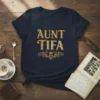 AUNT TIFA t-shirt with distressed golden typography and ornate scrollwork featuring a crown