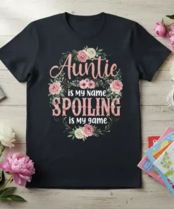 Auntie is my name SPOILING is my game quote with floral wreath on a black t-shirt