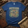 Auntiesaurus text above a dinosaur skeleton graphic with jungle leaves, on a blue t-shirt