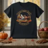 Autumn Equine Parade Harvest Festival text with four horses and fall leaves graphic on a black t-shirt