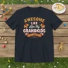 Awesome Like My Grandkids Est Forever text with elephants on a navy t-shirt, vintage style graphic